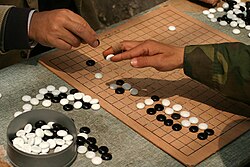 250px-Playing_weiqi_in_Shanghai.jpg